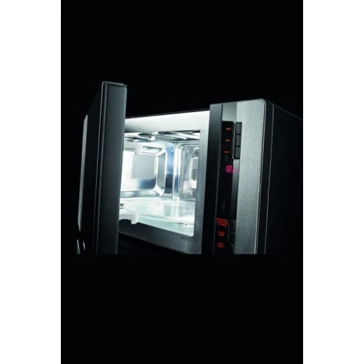 فرن ميكروويف مدمج من الستانلس ستيل من Gorenje مع شواية، سعة 30 لتر، عرض 60 سم. جهاز مطبخ متكامل للطهي السهل. يتميز بوظائف الميكروويف والشواء وتسخين فعال للمطابخ الحديثة. - جورينيه - Image 4