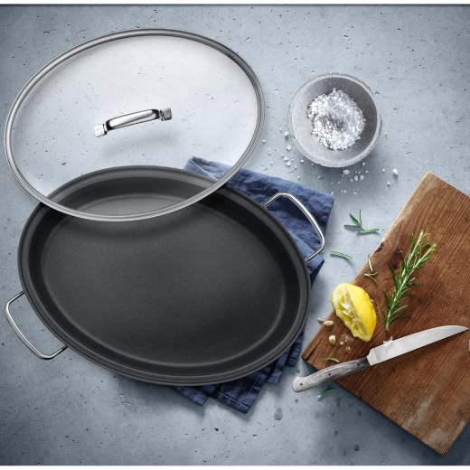 WMF Oval Fish Frying Pan 38x26cm with Glass Lid 18/10 Stainless Steel Heat-Resistant Handles TransTherm Base Suitable for All Stovetops Including Induction - WMF - Image 6