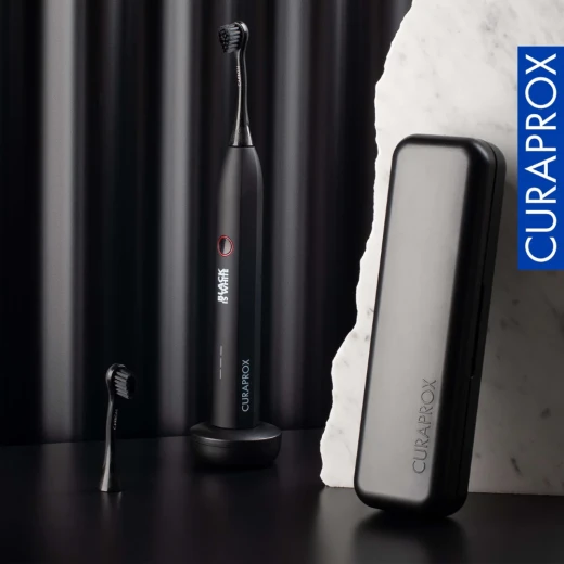 فرشاة أسنان كهربائية Curaprox Black Is White Hydrosonic للعناية باللثة وتبييض الأسنان - Image 2