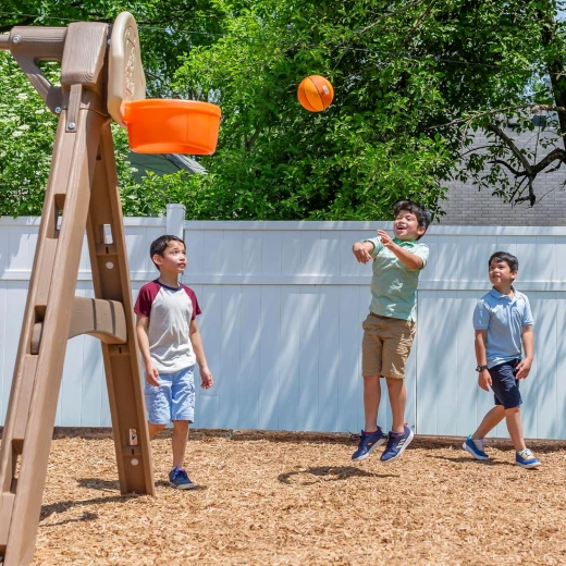 Step2 Naturally Playful Adventure Lodge Play Center with Glider, Kids Outdoor Playset, Two Tier Backyard Playground Set, Slide, Swings, Rope Ladder, Basketball Hoop, Jungle Gym, Children 3-8 Years Old - Step2 - Image 5