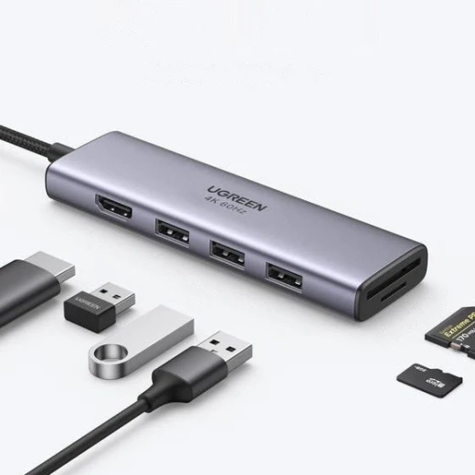 محول يو جرين 6 في 1 بمنفذ USB-C، منفذ HDMI، 3 منافذ USB 3.0، قارئ بطاقات SD/TF، رمادي محول يو جرين 6 في 1 بمنفذ USB-C، منفذ HDMI، 3 منافذ USB 3.0، قارئ بطاقات SD/TF، رمادي