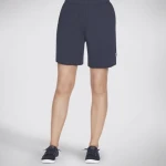 شورت تيري للنساء من سكيتشرز، تصميم BOBS Purrrfect بطول 7 بوصة، أزرق داكن، قماش قطني/بوليستر، تصميم صبغة ربطة عنق، خصر مطاطي وأساور مقاس L، ملابس نسائية عصرية ومريحة - سكيتشرز