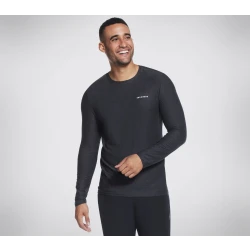 تي شيرت رجالي بأكمام طويلة من سكيتشرز GO DRI All Day باللون الأسود، مصنوع من مواد معاد تدويرها. قماش مطاطي نشط وقابل للتنفس لراحة يومية. مقاس S، رقم المنتج LT11 BKCC.