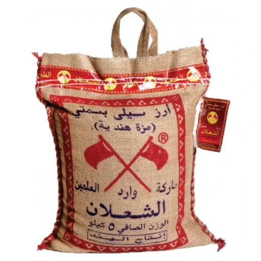 أرز بسمتي الشعلان الفاخر بجودة ممتازة 5 كجم كيس أرز أبيض طويل الحبة مثالي للبرياني والبلو والأطباق اليومية يقدم نكهة عطرية وقواماً رقيقاً ومفلفلاً أرز بسمتي الشعلان الفاخر بجودة ممتازة 5 كجم كيس أرز أبيض طويل الحبة مثالي للبرياني والبلو والأطباق اليومية يقدم نكهة عطرية وقواماً رقيقاً ومفلفلاً