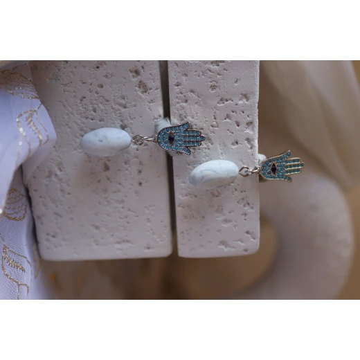 Unique drop earrings combining the Hamsa hand charm, embellished with turquoise zircon, with a marbled oval bead handcrafted from polymer clay. A stylish piece that reflects cultural beauty and symbolic protection - Lumique - Image 2