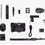 Canon EOS R50 V with RF-S 14-30mm PZ lens, a compact mirrorless camera built for content creators, offering high-quality video and photos, wide-angle zoom, fast autofocus, smooth performance, and lightweight design ideal for vlogging and social media - Canon