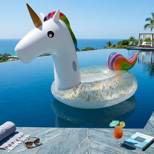 Giant Inflatable Glitter Unicorn Floater Air Mattress With Handles Age 14+ Size 275 x 140 x 120 cm High Quality Vinyl White With Rainbow Mane (EN15649-1) Giant Inflatable Glitter Unicorn Floater Air Mattress With Handles Age 14+ Size 275 x 140 x 120 cm High Quality Vinyl White With Rainbow Mane (EN15649-1)