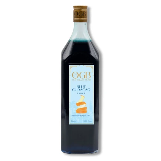 OGB Blue Curacao Syrup 1 liter A tropical citrus blue flavor, perfect for cocktails and exotic drinks OGB Blue Curacao Syrup 1 liter A tropical citrus blue flavor, perfect for cocktails and exotic drinks