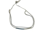 AURA Delicate gold zircon bracelet with a double-rope design – one lined with crystals, the other uniquely textured. A stylish, free-size piece for refined elegance - Aura