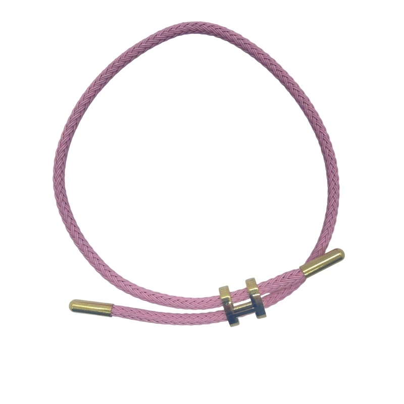 AURA Soft pink H-shaped bracelet – a feminine, free-size piece that adds a warm and modern touch to your everyday style. - Aura